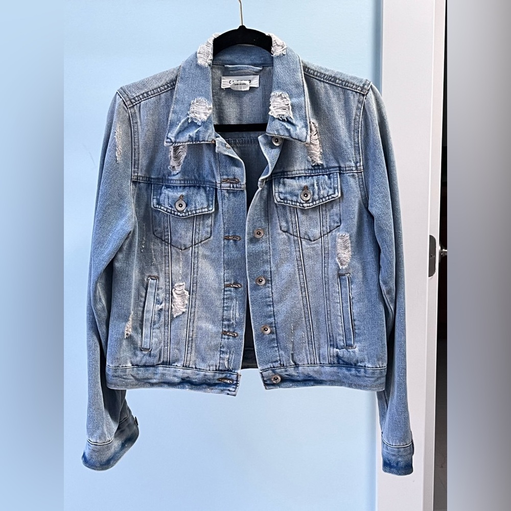 Distressed jean jacket